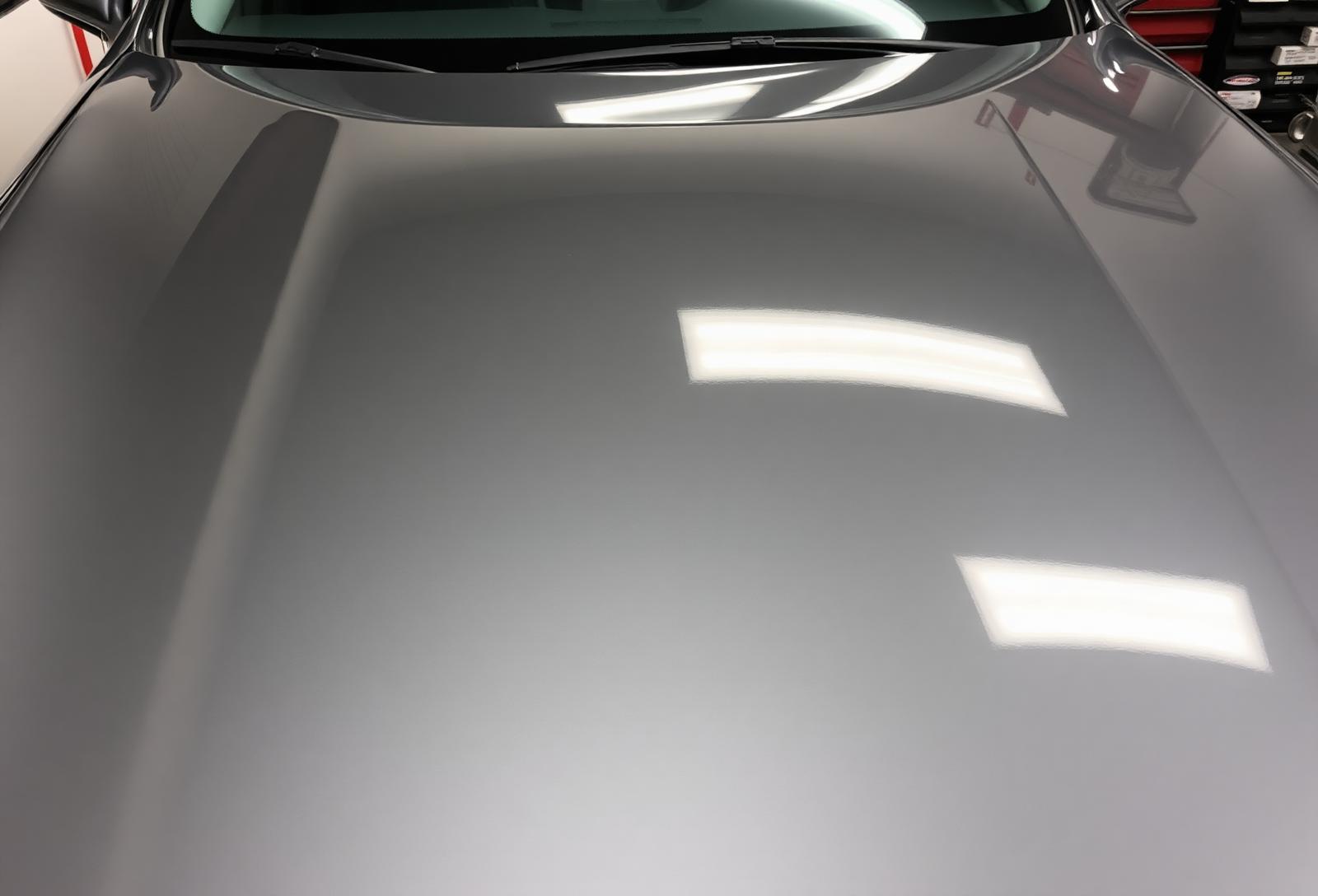 Real close-up after LETS GET WRAP hand-cut PPF install — mirror-flat finish
